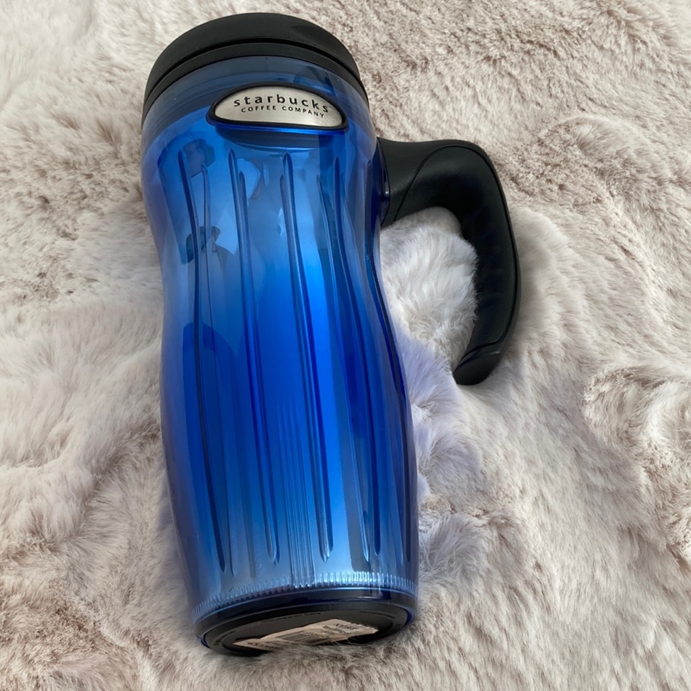 STARBUCKS Groovy Lucy blue tumbler travel mug with handle.
